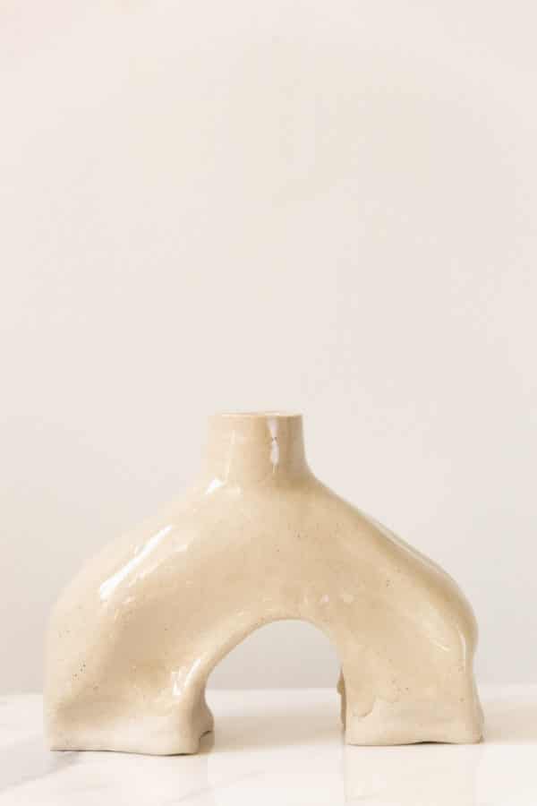 Large hand-built beige ceramic vase this is uniquely curved